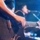 Guitarist on stage for background, soft and blur concept