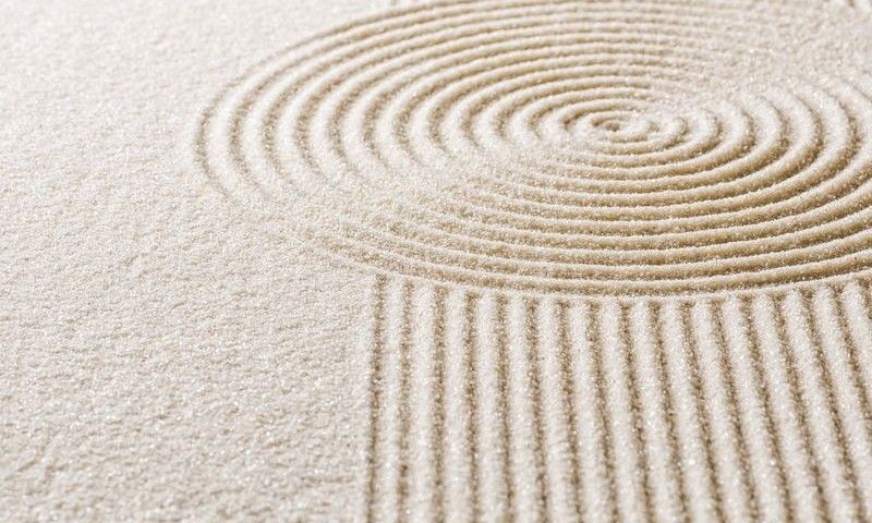 Sand mit Linien und Kreisen
