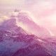 beautifull cloudy sunrise in the mountains with snow ridge. Trek around Annapurna mount. Himalaya, Nepal.