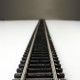 close up shot of a toy railway line going of into the distance