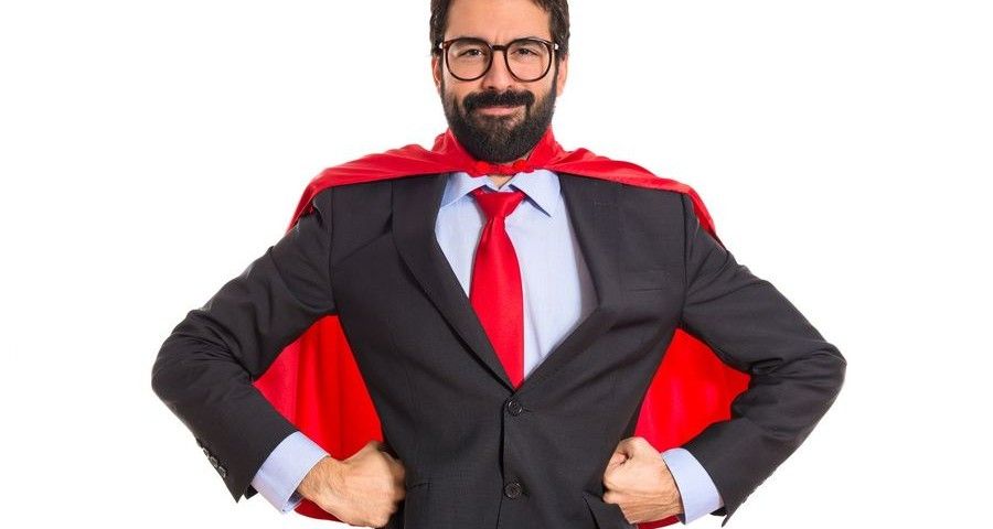 Businessman dressed like superhero