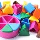 Trivial Pursuit pieces on a white background