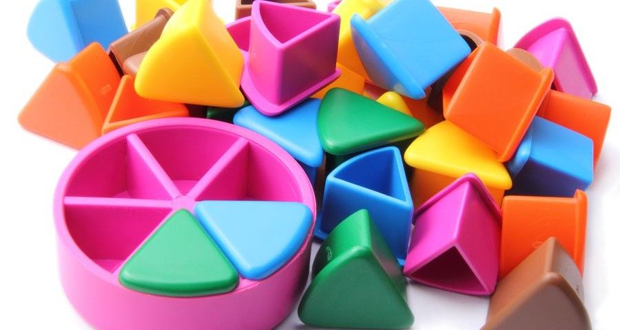 Trivial Pursuit pieces on a white background