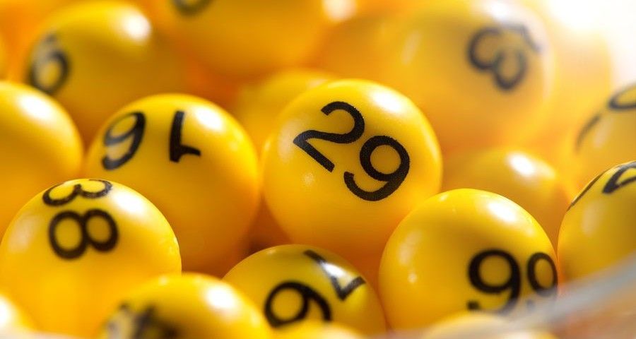 Background of yellow balls with bingo numbers used to randomly select lucky numbers during a bingo game