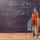 Back to school background with rocket made from pencils