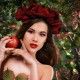 beautiful girl with a wreath on his head with apple